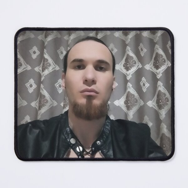 Item preview, leo the artist Sitting Indoors Wearing a Leather Jacket Pendant and Undershirt designed and sold by Beautiful art store.