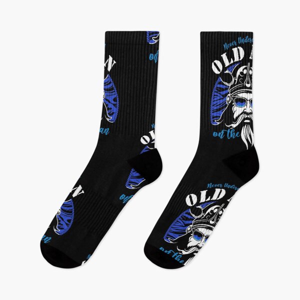Item preview, NEVER UNDERESTIMATE AN OLD MAN SAILING designed and sold by Madjack Tees Kiwi SuperStore.