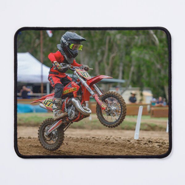 Item preview, Motocross rider landing over a jump designed and sold by RedChevy.