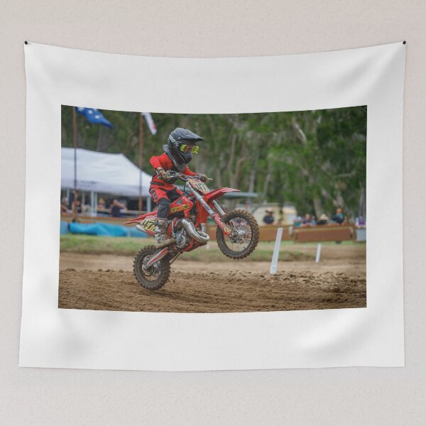 Item preview, Motocross rider landing over a jump designed and sold by RedChevy.