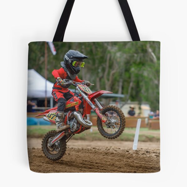 Item preview, Motocross rider landing over a jump designed and sold by RedChevy.