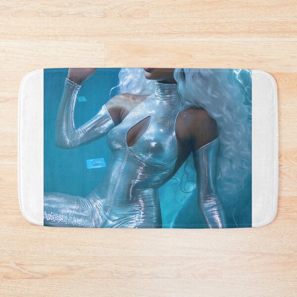 Item preview, A model with long, wavy hair poses underwater in a reflective suit, surrounded by sparkling blue light and a serene ambiance. designed and sold by anytka.