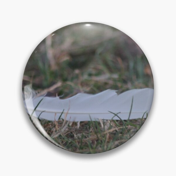 Item preview, White feather on grass  designed and sold by Emma  Amies.