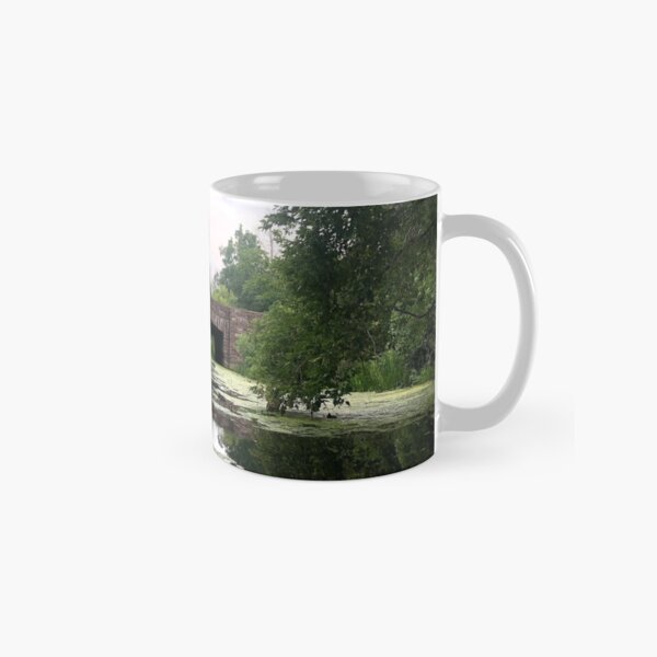 Item preview, Kayaking under a rustic stone bridge surrounded by lush greenery along Yanty Creek. designed and sold by LovinNatureCyn.