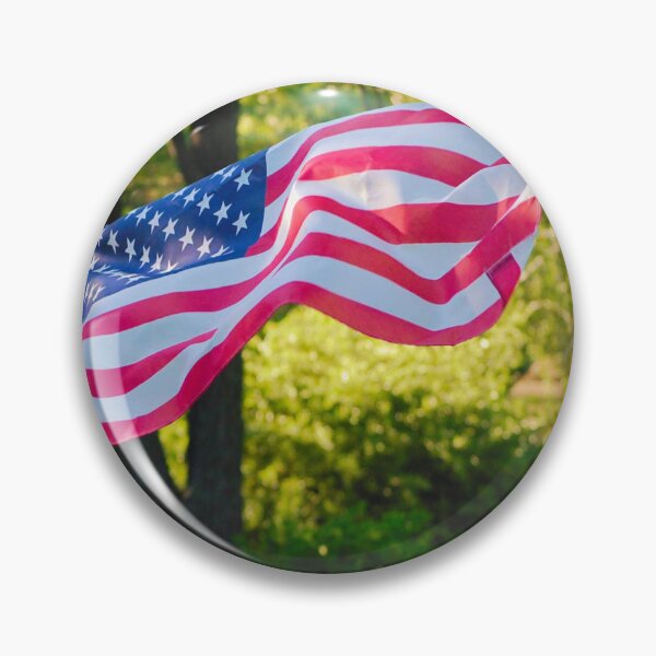 Item preview, American Flag Rippling in Front of Tree and Greenery  designed and sold by CountyKent.