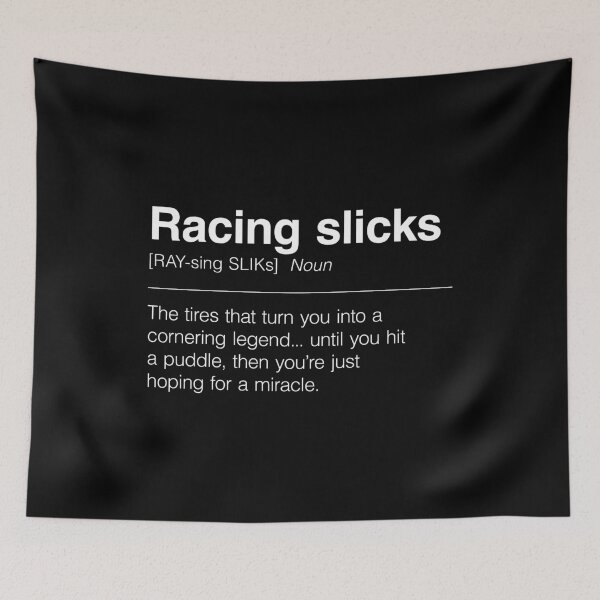 Item preview, Funny Definition of Racing Slicks | The Tires That Turn You Into a Cornering Legend... Until You Hit a Puddle, Then You’re Just Hoping for a Miracle designed and sold by ApexFibers.