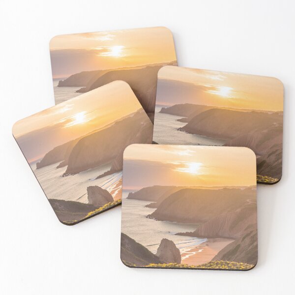Item preview, A serene coastal sunset with cliffs and beach designed and sold by homydesign.