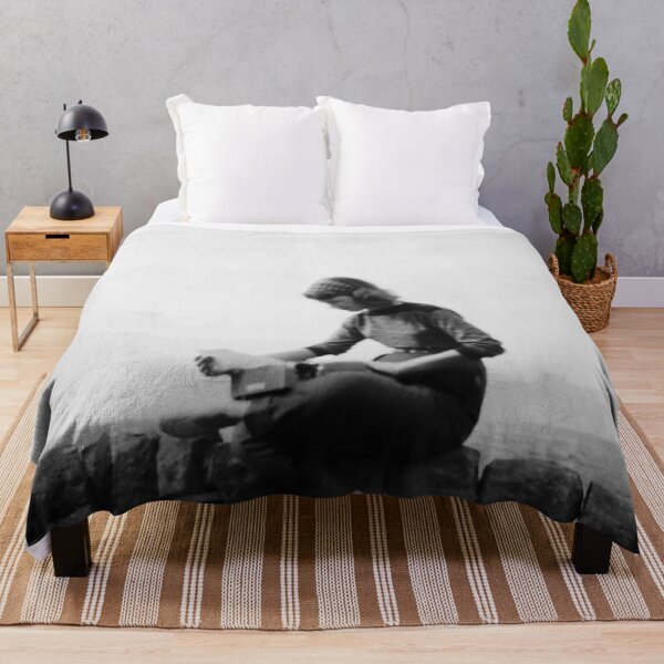 Item preview, Sylvia Plath iconic portrait typing outdoors designed and sold by Oqueartecura.