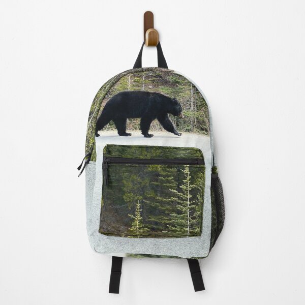 Item preview, Black bear walks alongside the road in Jasper National Park, Canada designed and sold by MostSplendid.