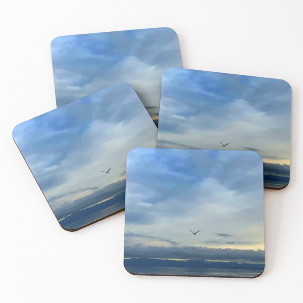 Item preview, A bird flies across the sky at sunset with clouds in the background designed and sold by MostSplendid.