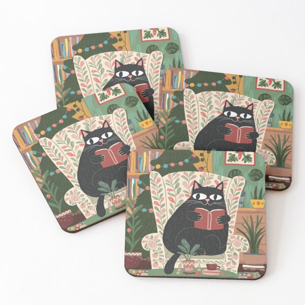 Item preview, Merry Christmas book lovers! A cute black kitten in a festive Christmas mood is chilling in an armchair while reading a book. designed and sold by SaraSumi.