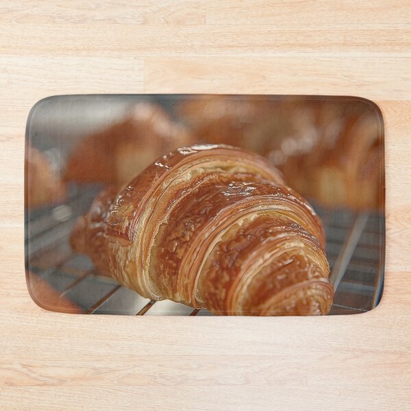 Item preview, Perfectly Baked Croissant on Bakery Rack with Flaky Golden Brown  designed and sold by CheerForGoods.