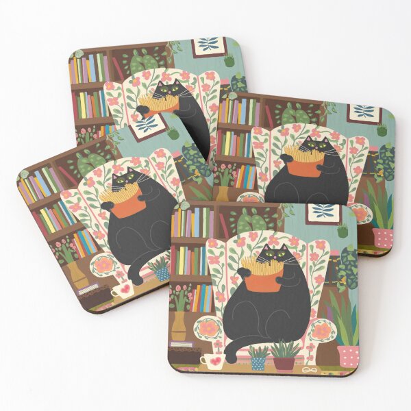 Item preview, A cute black, chubby kitten in is chilling in an armchair while eating french fries. designed and sold by SaraSumi.