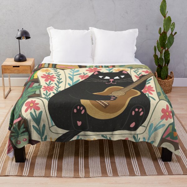 Item preview, Listen to the master of guitar chords! A cute, black is chilling in an armchair while playing the guitar. designed and sold by SaraSumi.