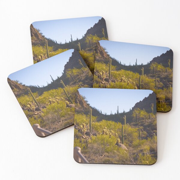 Item preview, Sunlight bathes a desert landscape filled with towering cacti and scattered shrubs designed and sold by EyezWatchin.