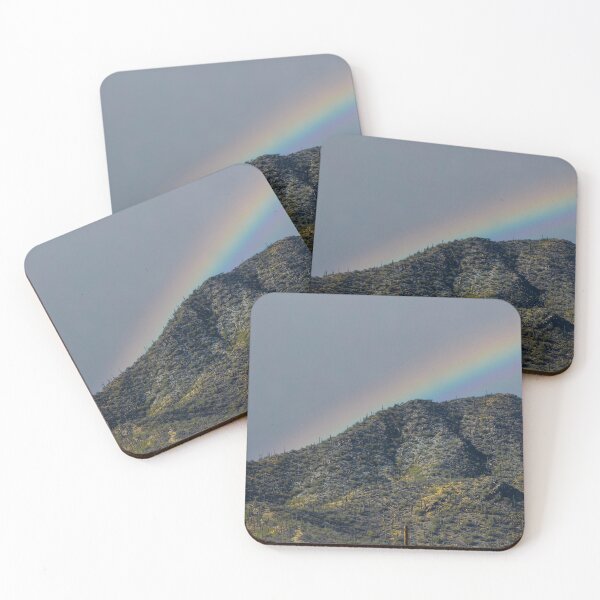 Item preview, A vibrant rainbow stretches across a mountainous landscape covered in desert vegetation designed and sold by EyezWatchin.