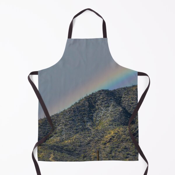 Item preview, A vibrant rainbow stretches across a mountainous landscape covered in desert vegetation designed and sold by EyezWatchin.
