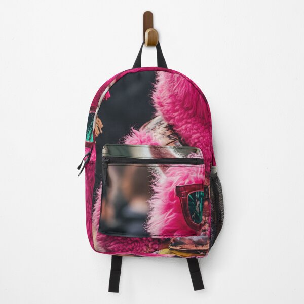Item preview, A vibrant pink llama wearing sunglasses poses for the camera in a lively urban setting during a festive gathering designed and sold by anytka.