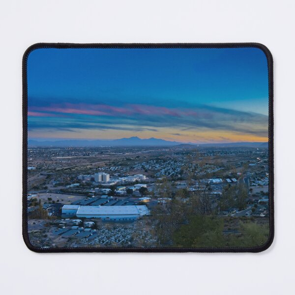 Item preview, A sprawling Tucson urban landscape stretches beneath a vibrant colorful sunset sky designed and sold by EyezWatchin.