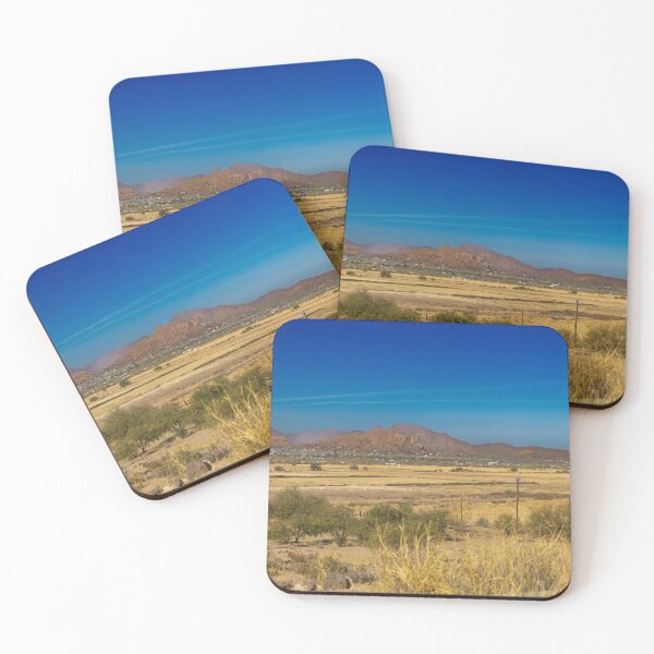 Item preview, A vast expanse of desert landscape stretches under a clear blue sky, with distant Catalina Mountains forming a jagged horizon designed and sold by EyezWatchin.