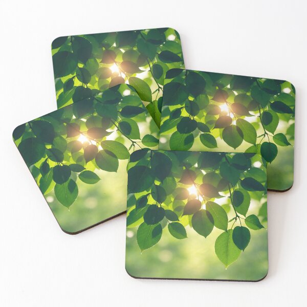 Item preview, A lush canopy of green leaves, with sunlight filtering through, creating a radiant glow.  designed and sold by artumbre.