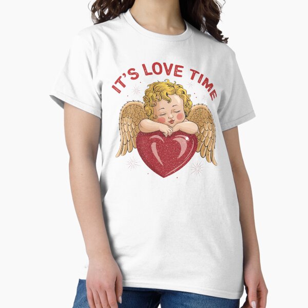 Item preview, It's Love Time T-Shirt - Cute Angel with Heart Graphic Tee, Romantic Gift for Valentine's Day, Trendy Unisex Shirt designed and sold by Tshirtis.