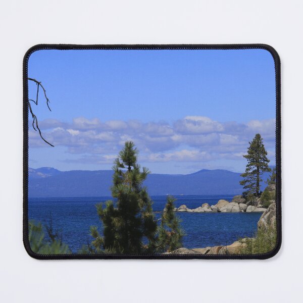Item preview, Lake Tahoe California with blue water, Trees, sky and a Mountain. designed and sold by ROBERTDBROZEK.