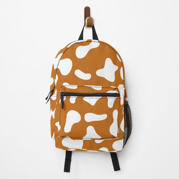 Aperçu de l'œuvre Motif vache blanche sur fond caramel | Motif vache Holstein créée et vendue par PatternPen.