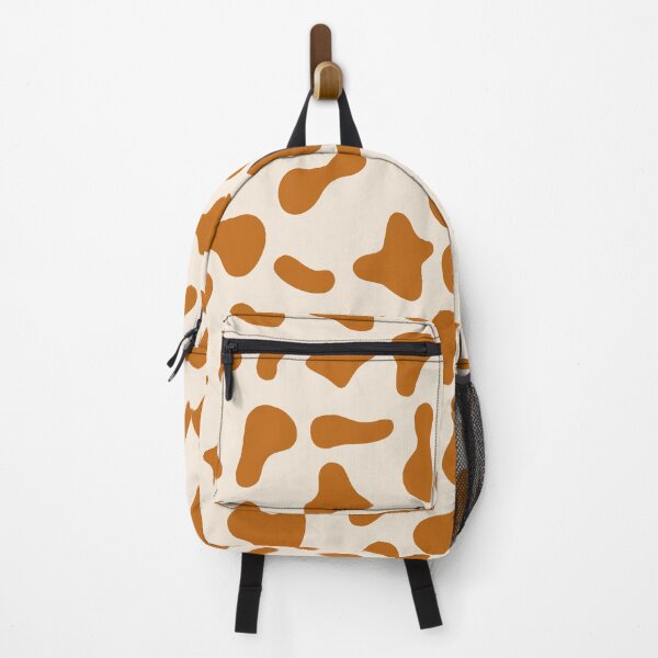 Aperçu de l'œuvre Motif vache caramel sur fond crème | Motif vache Holstein créée et vendue par PatternPen.