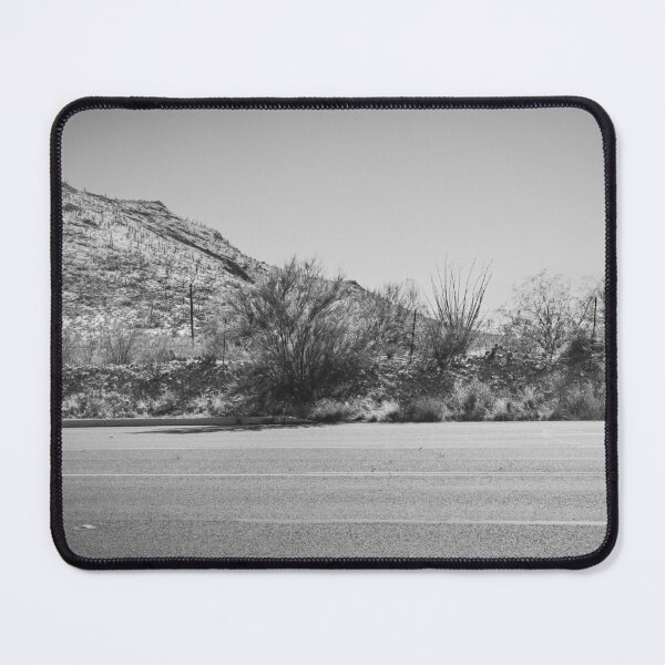 Item preview, A captivating view of Tucson, Arizona, where a winding road snakes through the vast desert landscape designed and sold by EyezWatchin.