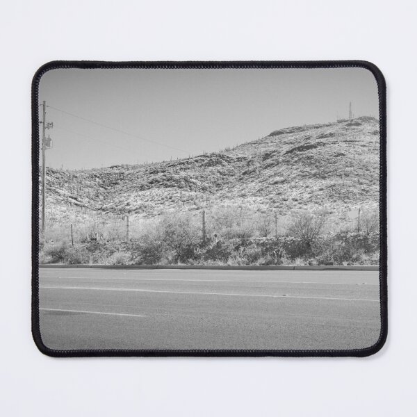 Item preview, A captivating view of Tucson, Arizona, where a winding road snakes through the vast desert landscape designed and sold by EyezWatchin.