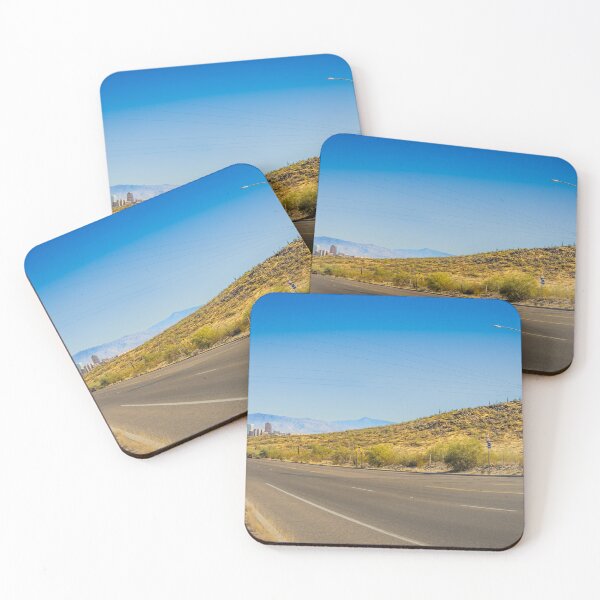 Item preview, A captivating view of Tucson, Arizona, where a winding road snakes through the vast desert landscape designed and sold by EyezWatchin.
