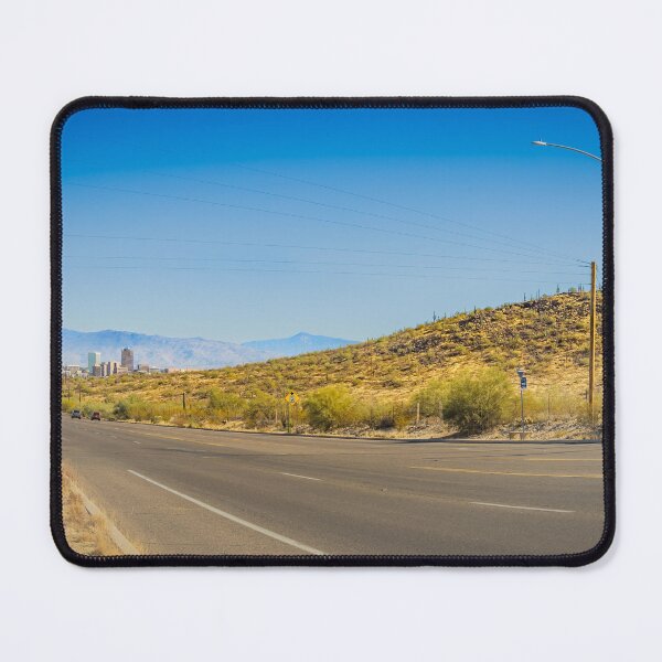 Item preview, A captivating view of Tucson, Arizona, where a winding road snakes through the vast desert landscape designed and sold by EyezWatchin.