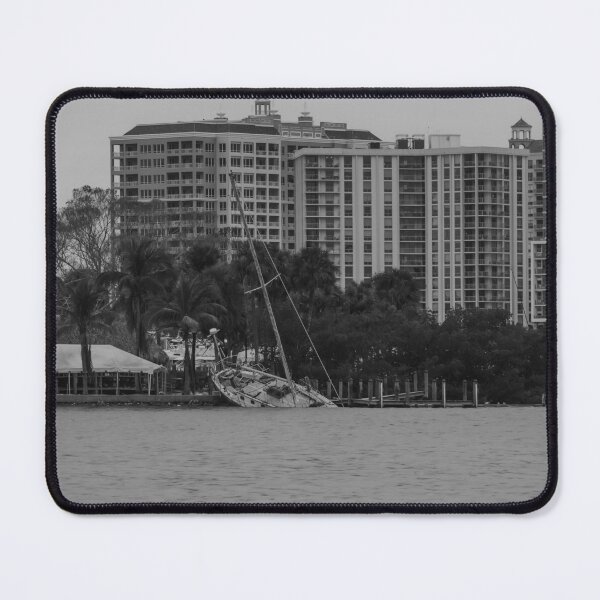 Item preview, Haunting monochrome photograph captures the aftermath of Hurricane Milton at Bayfront Park in Sarasota, Florida designed and sold by EyezWatchin.