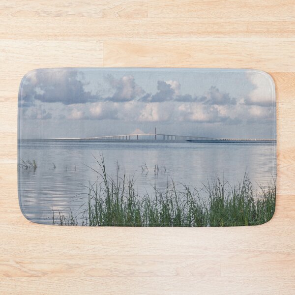 Item preview, The Sunshine Skyway Bridge Tampa Bay Pinellas County Florida is framed by tall grasses in the foreground designed and sold by EyezWatchin.