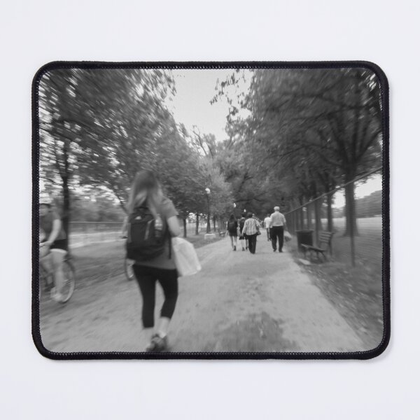 Item preview, A monochrome scene captures people walking and biking along a tree-lined path in a The National Mall Washington DC 2011 designed and sold by EyezWatchin.