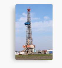 land oil drilling rig with equipment on oilfield Canvas Print
