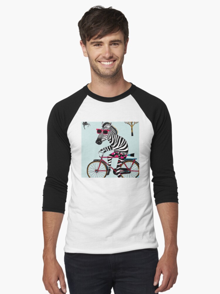 Thumbnail 1 von 3, Baseballshirt mit 3/4-Arm, Zebra auf dem Fahrrad - Zebra riding a Bike designt und verkauft von Evelyn3112.