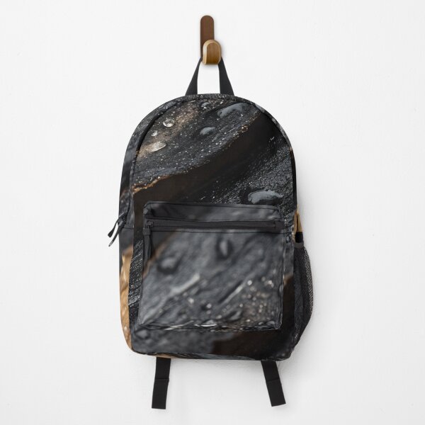 Item preview, Close-up of textured black wood with droplets after rain in a natural setting highlighting organic shapes and rich material depth designed and sold by anytka.