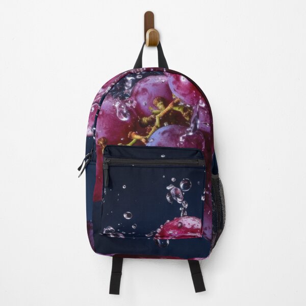Item preview, A bunch of purple grapes is captured mid-air with water splashing around them designed and sold by anytka.