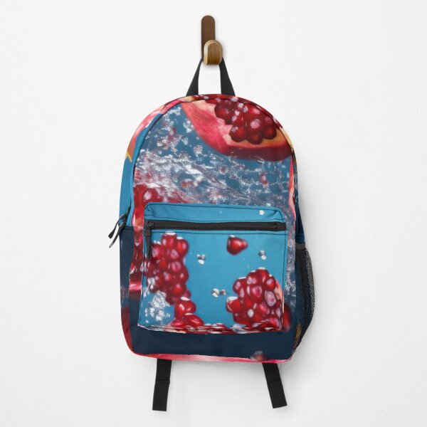 Item preview, Juicy pomegranate halves amidst splashes of water, designed and sold by anytka.