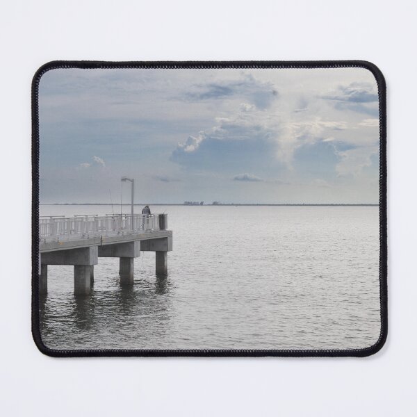 Item preview, Gulf Fishing Pier at Fort Desoto stretching out into the calm waters of Tampa Bay beneath a dramatic blue and cloudy sky designed and sold by EyezWatchin.
