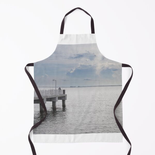Item preview, Gulf Fishing Pier at Fort Desoto stretching out into the calm waters of Tampa Bay beneath a dramatic blue and cloudy sky designed and sold by EyezWatchin.