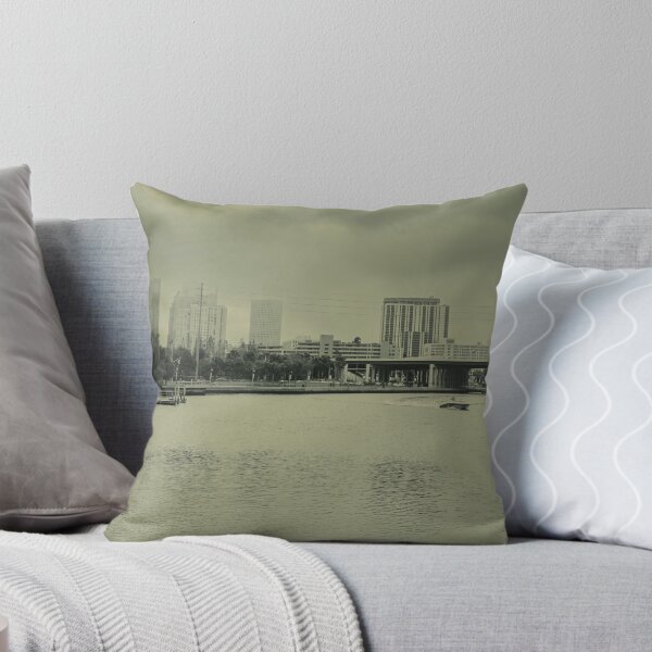 Item preview, A boat glides up the Tampa Bay Riverwalk under a dramatic cloudy sky designed and sold by EyezWatchin.