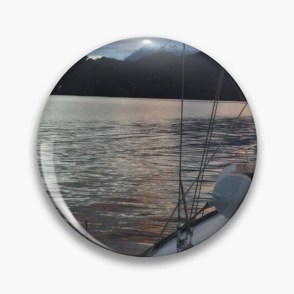 Item preview, Clouds at sunset reflect on the tranquil waters of Llancahue Island, Chiloé. designed and sold by MAMB007.