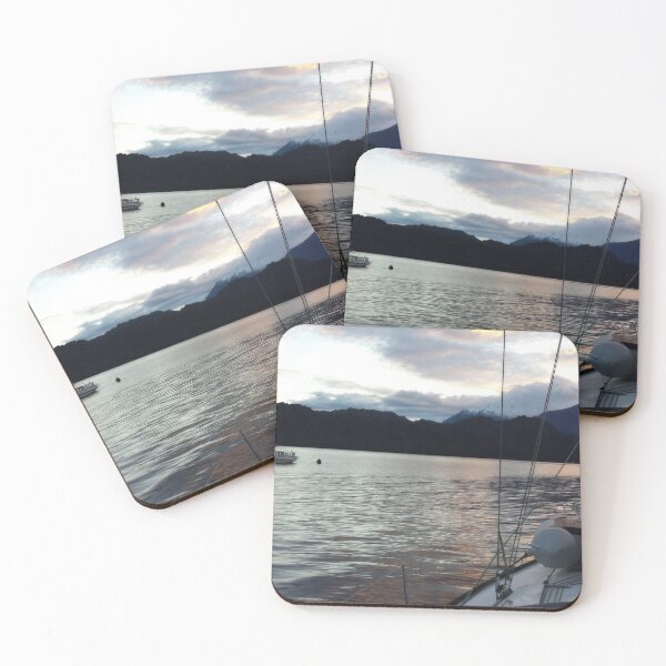 Item preview, Clouds at sunset reflect on the tranquil waters of Llancahue Island, Chiloé.  designed and sold by MAMB007.