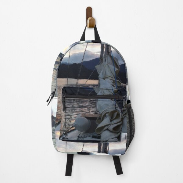 Item preview, Clouds at sunset reflect on the tranquil waters of Llancahue Island, Chiloé. designed and sold by MAMB007.