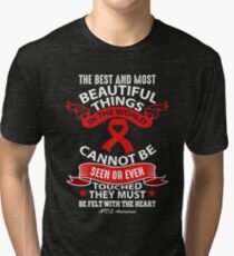 The Best and Most Beautiful Things in this world cannot be seen or even Touched. They must be felt with the heart. AIDS Awareness Quote Tri-blend T-Shirt