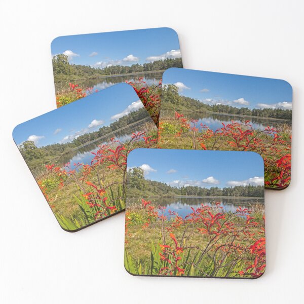 Item preview, Tranquil Lakeside with Vibrant Red Flowers designed and sold by David Patterson.