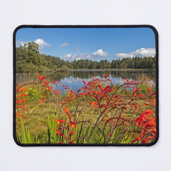 Item preview, Tranquil Lakeside with Vibrant Red Flowers designed and sold by David Patterson.